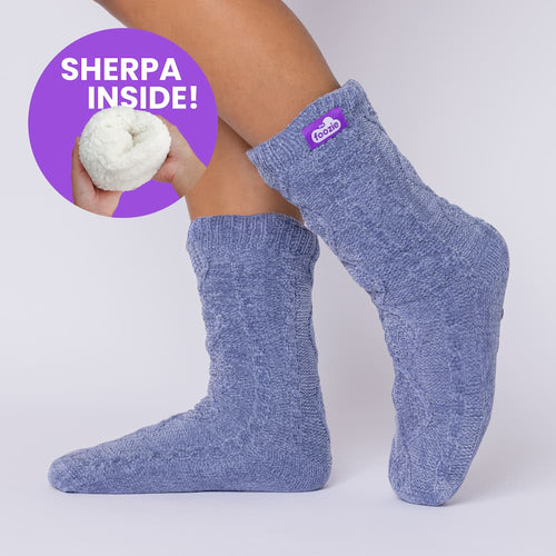 The Foozie™ Move in Blue, side view on foot with a 'Sherpa inside' badge showing the lining