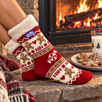 The Foozie™ Christmas Gingerbread slipper socks, by the fire