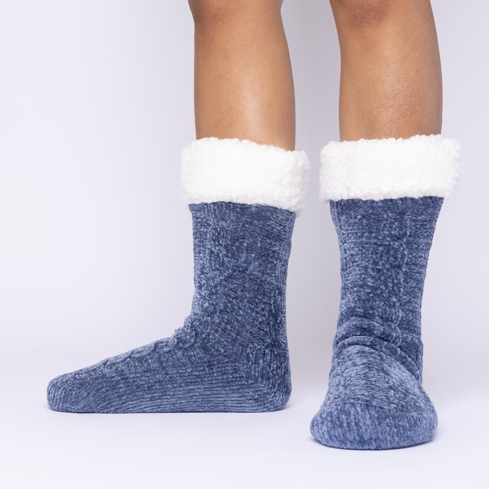 The Foozie™ in Blue, front view of both feet worn in Medium with the sherpa cuffs folded down