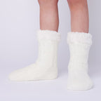 The Foozie™ in White, front view of both feet worn in Kids/Small with the sherpa cuffs folded down